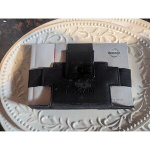 OEM owners manual for a 2011 Nissan Rogue